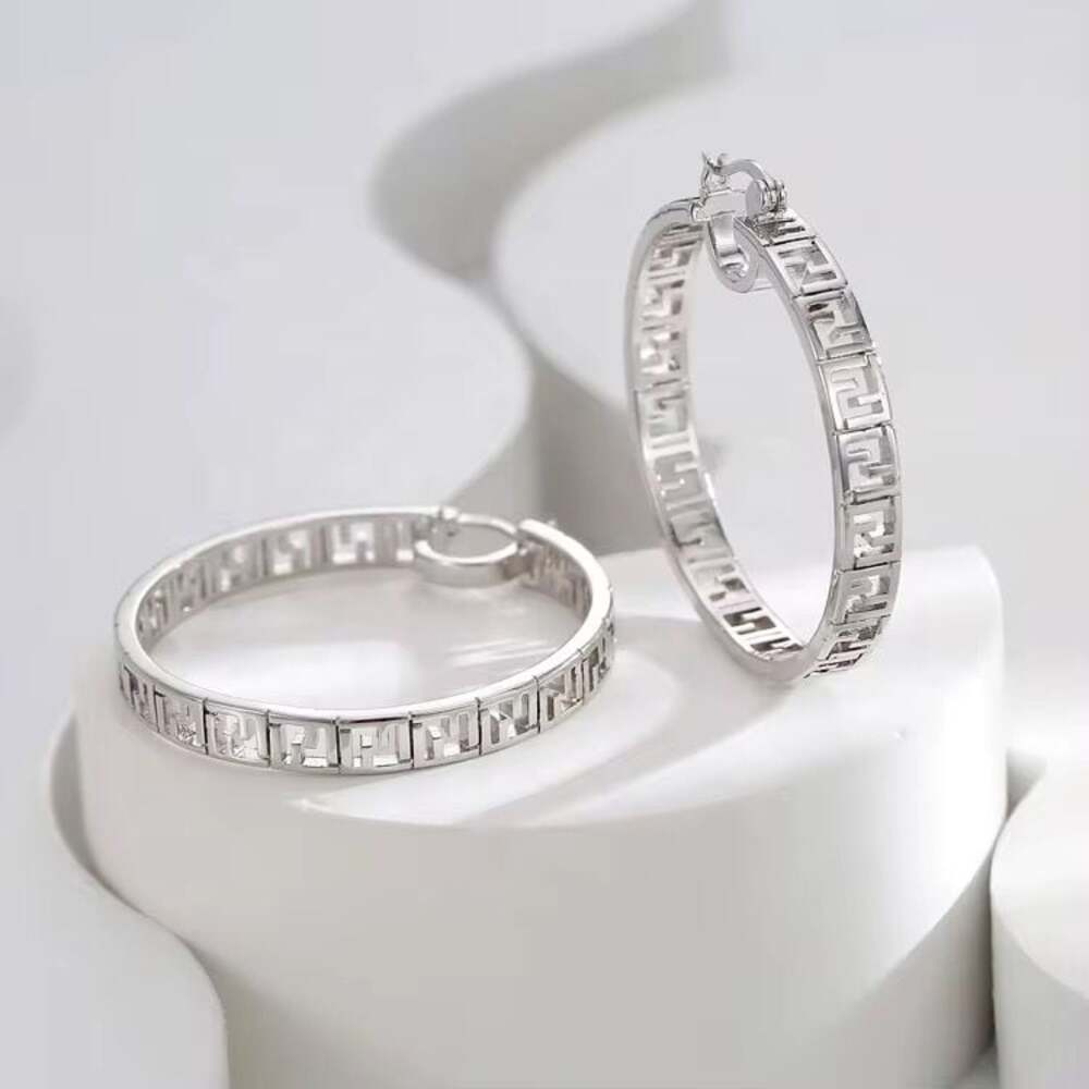 Medusa Pattern Silver Plated Hoop Earrings